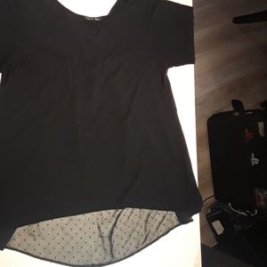 Black short sleeve top with polka dot lace inlay
